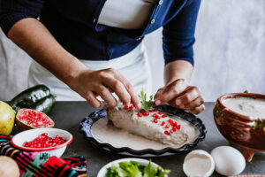 Mexican,Woman,Hands,Preparing,And,Cooking,Chiles,En,Nogada,Recipe 0