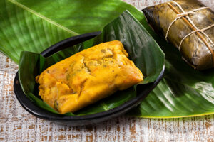 Tamale,Typical,Colombian,Food,Wrapped,In,Banana,Leaves 0